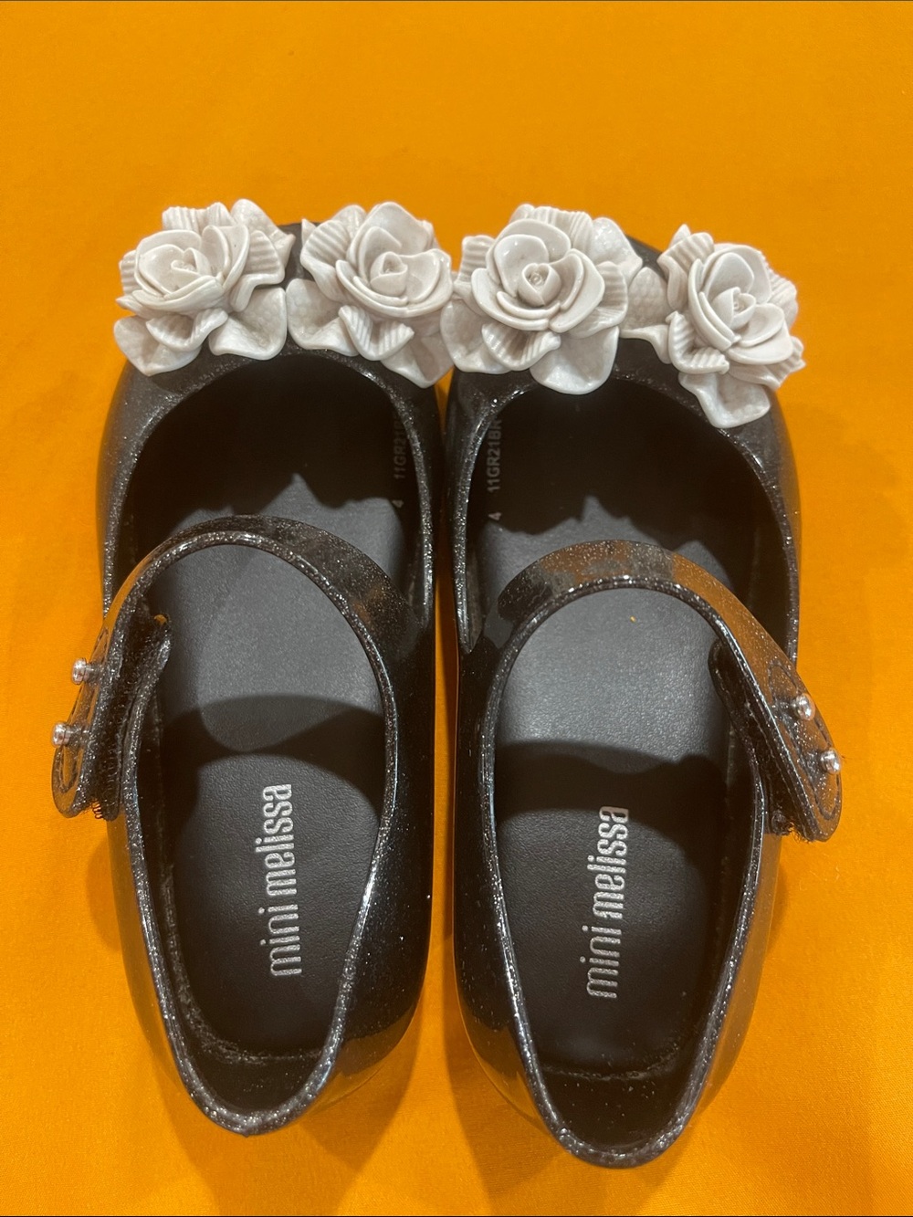 Mini Melissa Black Glitter Mary Janes with grayish Rose Trim
